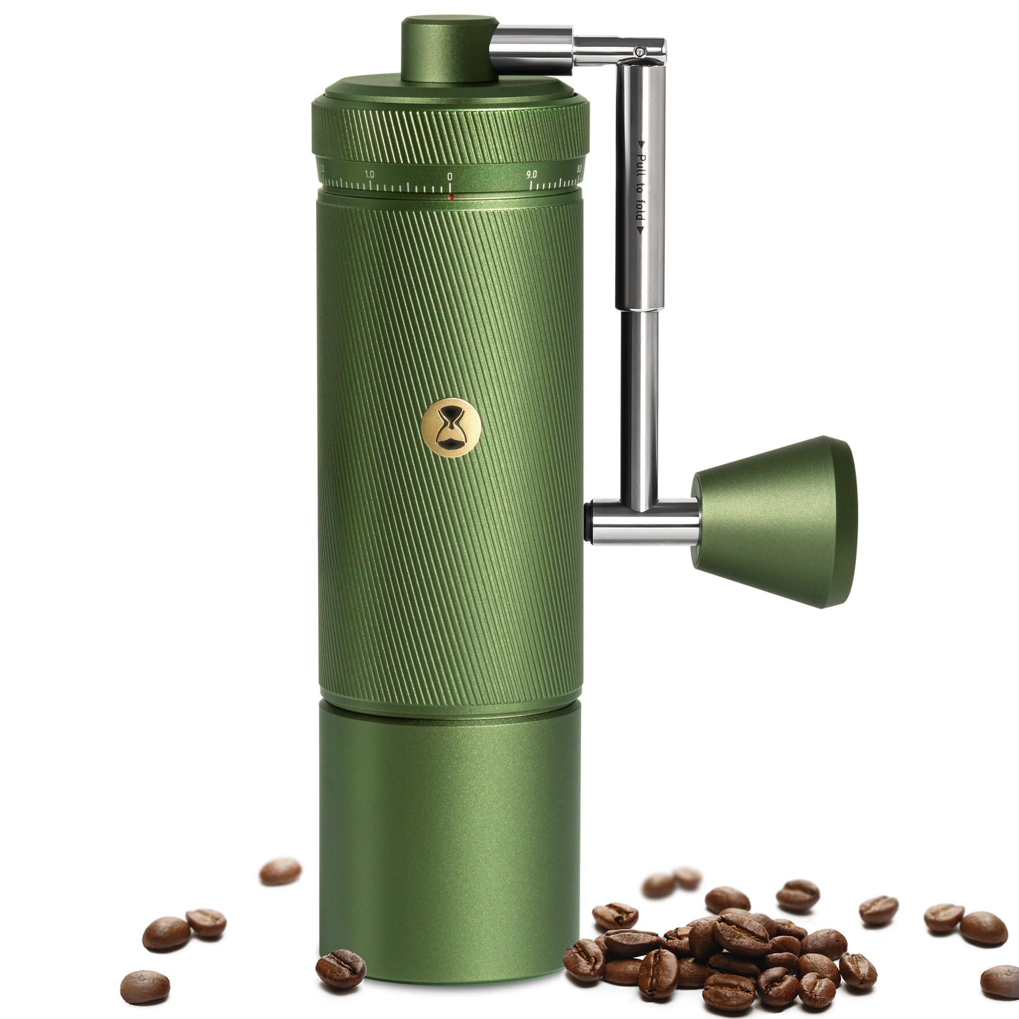 Green manual coffee grinder with coffee beans on a white background