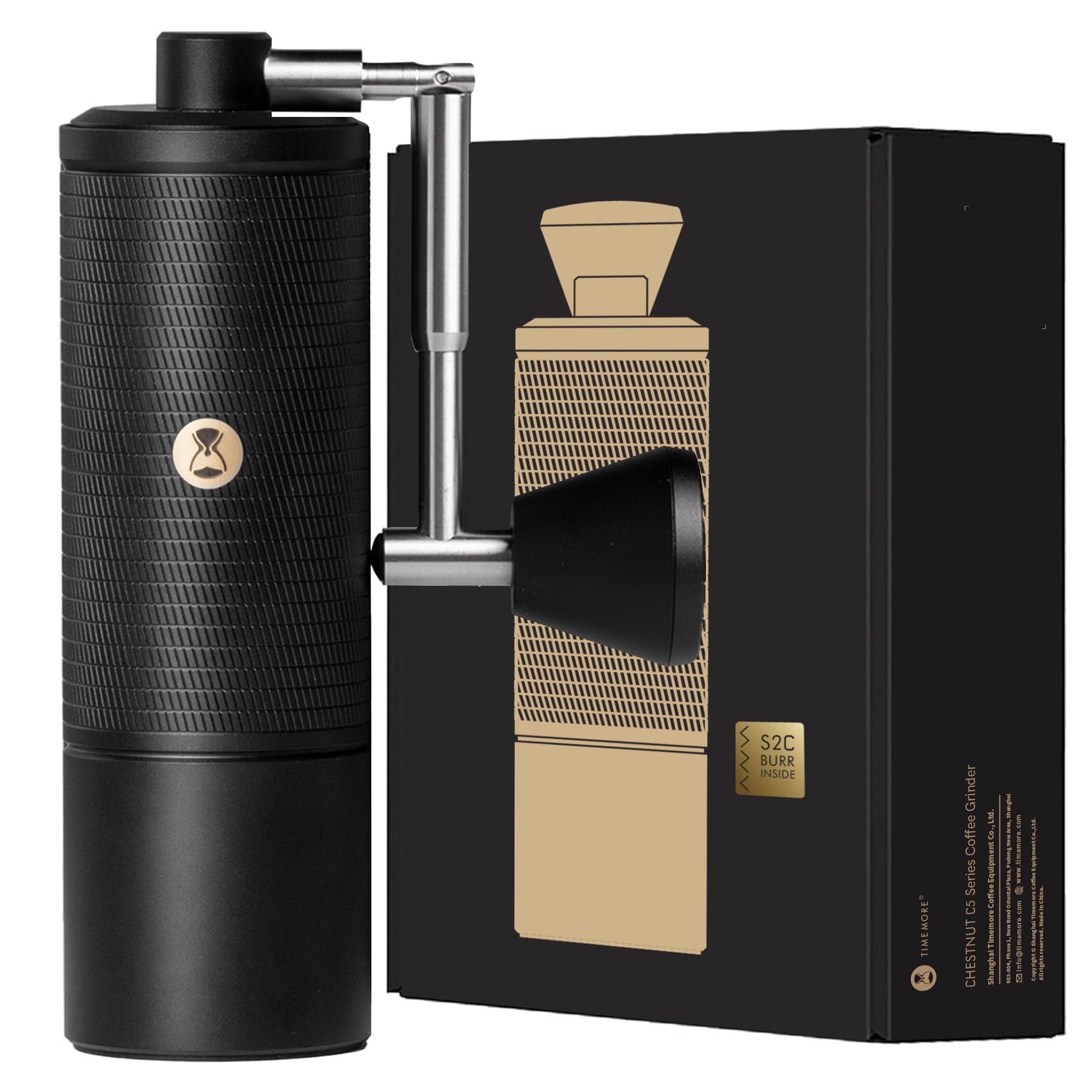 Black and gold coffee grinder with packaging on a white background