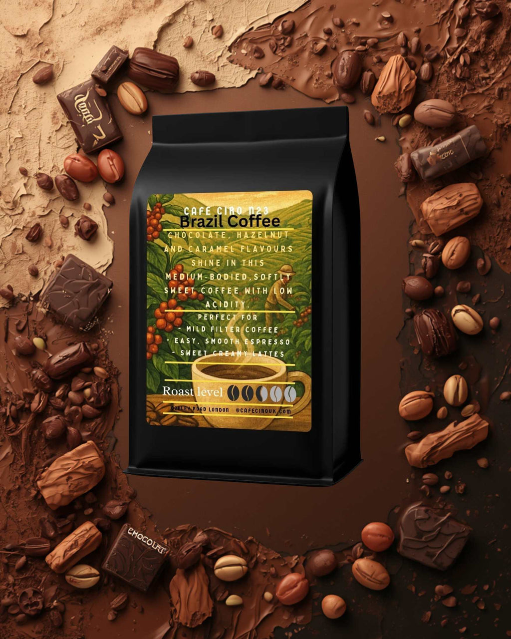 Coffee bag with a label surrounded by coffee beans and chocolate pieces on a brown background