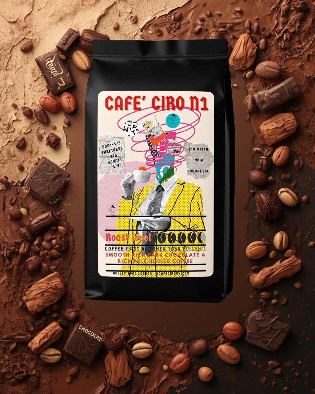 Cafe Ciro coffee package with a colorful label surrounded by chocolate and nuts on a brown background