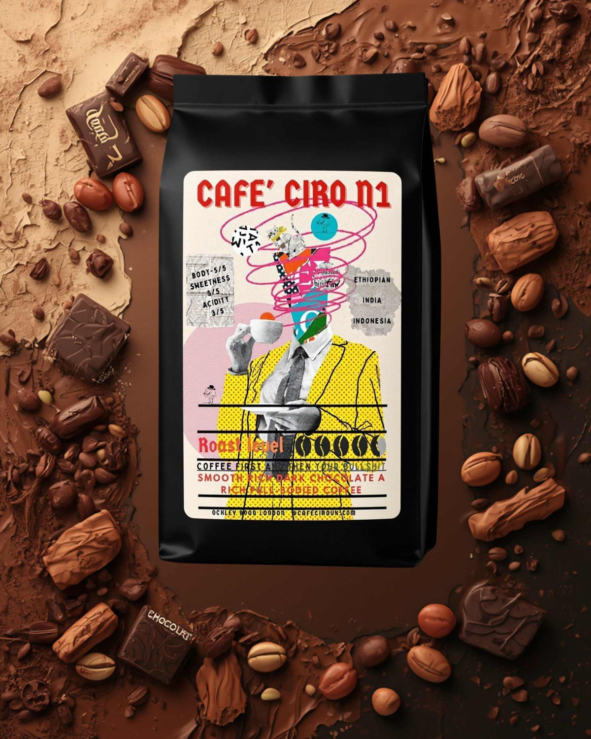Cafe Ciro coffee package with a colorful label surrounded by chocolate and nuts on a brown background