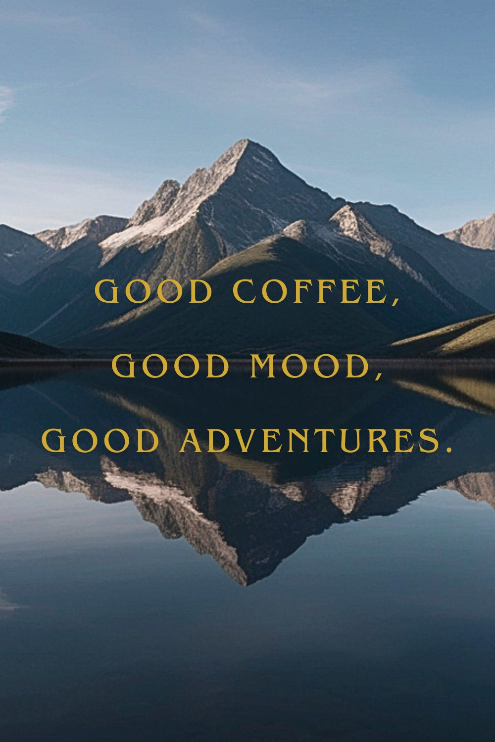 Mountain landscape with a calm lake reflection and gold text reading 'GOOD COFFEE, GOOD MOOD, GOOD ADVENTURES.'
